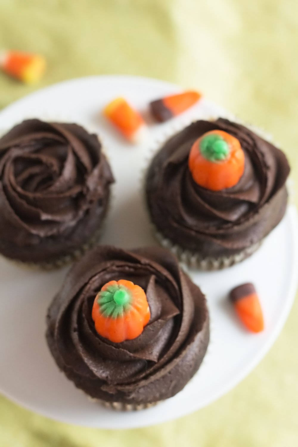 Pumpkin Chocolate Cupcakes, made from scratch. Recipe on itsyummi.com