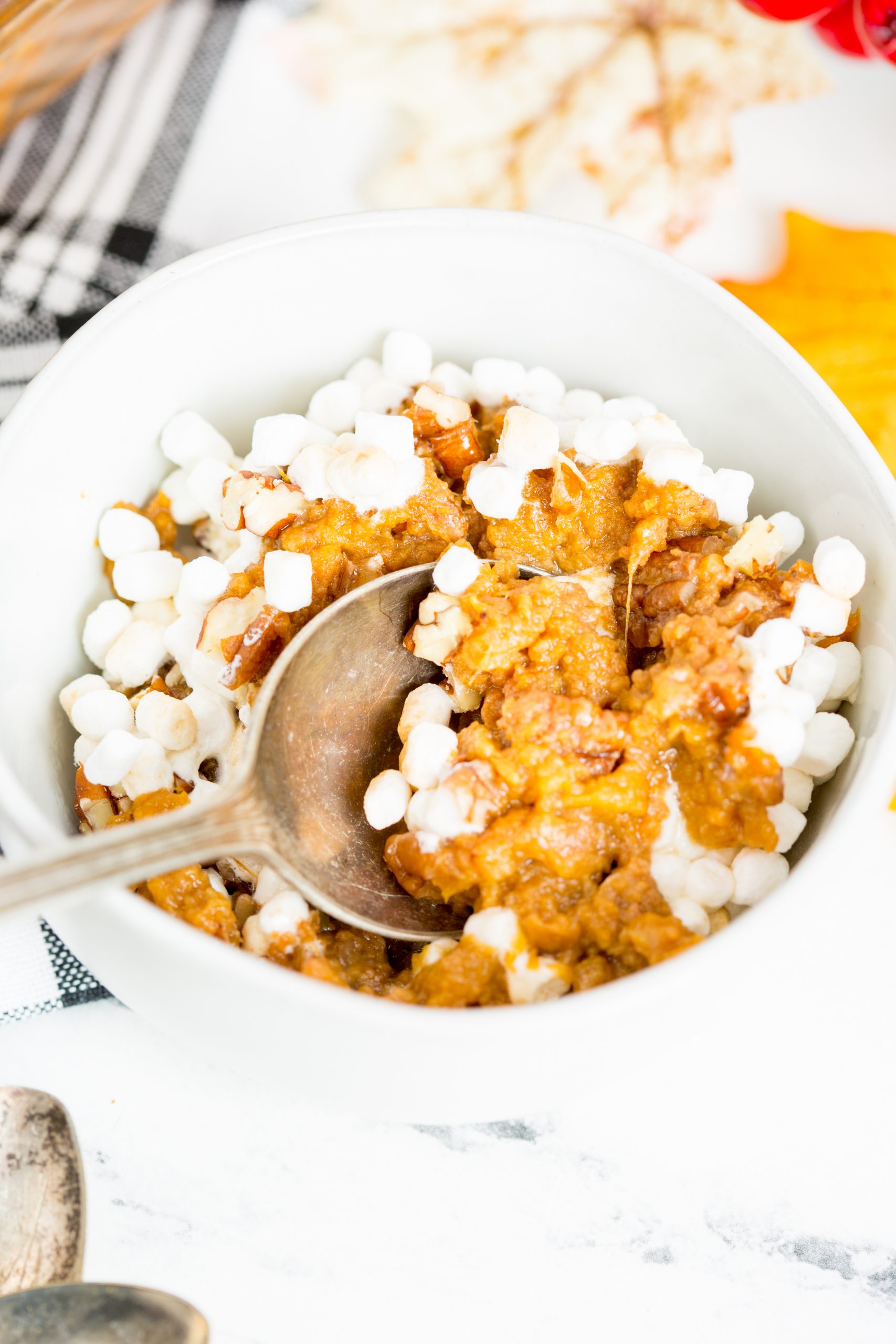 canned sweet potato casserole in a bowl with spoon